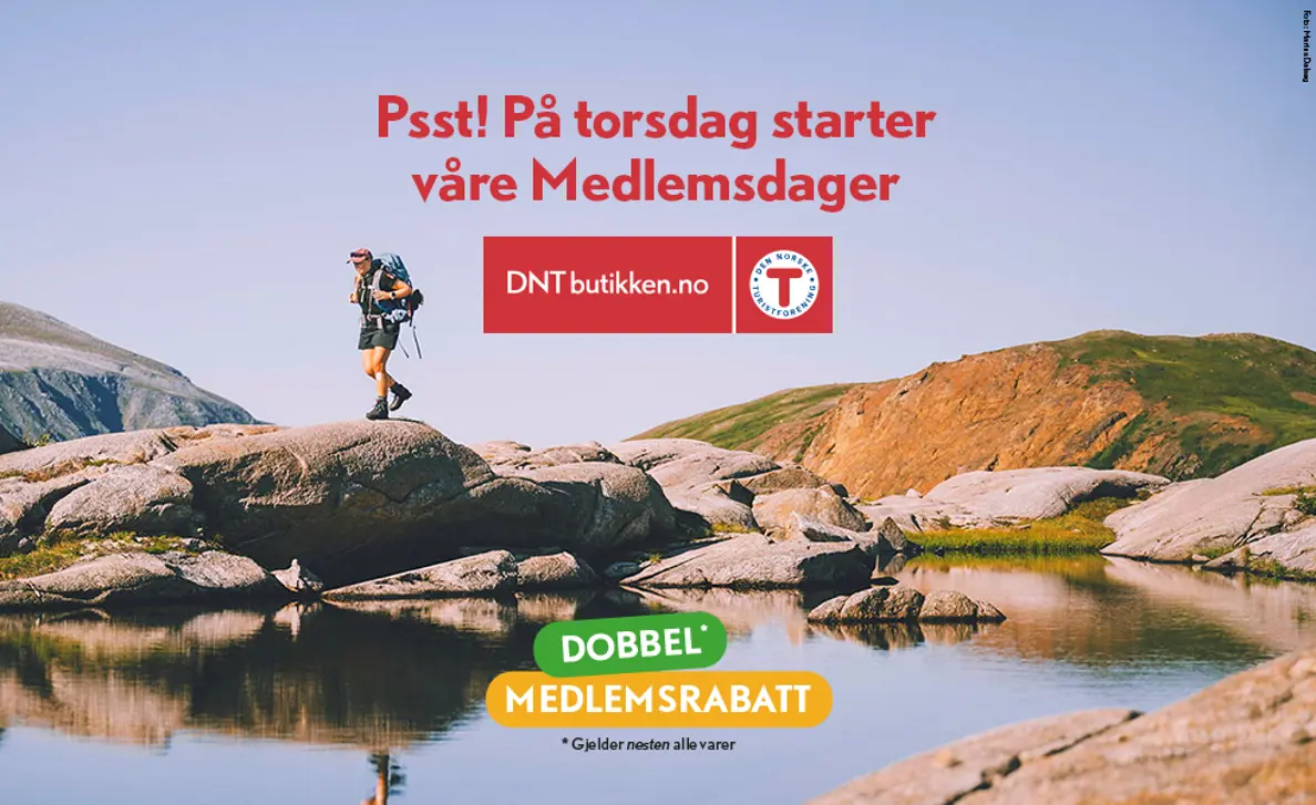 Annonse for medlemsdager med bilde av mann som går på berg