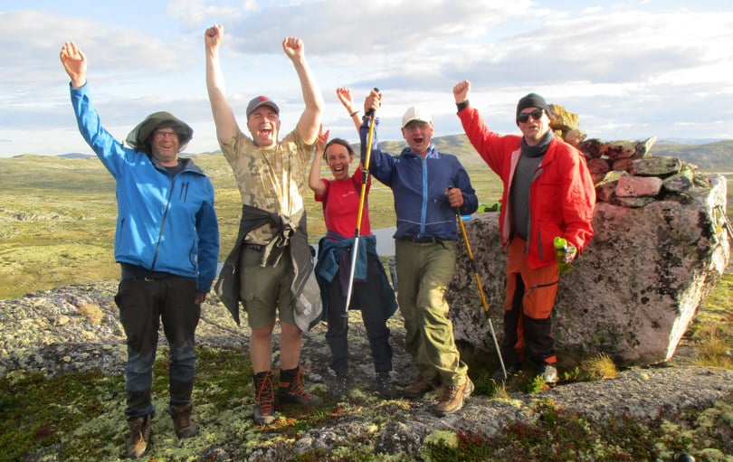 Glade turfolk på tur på Hardangervidda. 